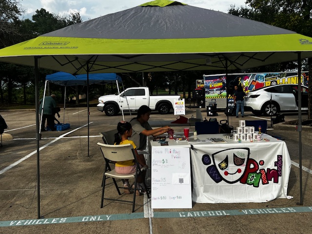 Community event setup with face painting station